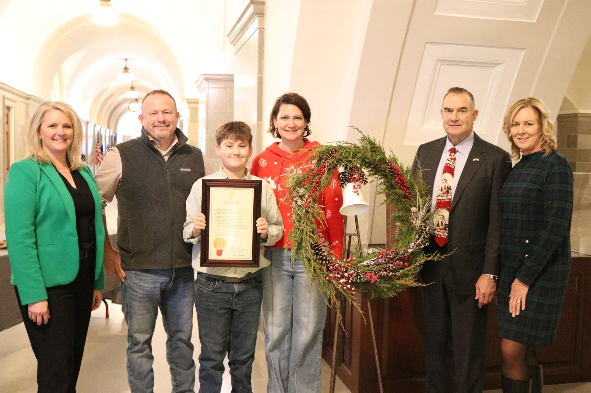 Route 24 Christmas Tree Farm presents wreath at the Missouri State Capitol